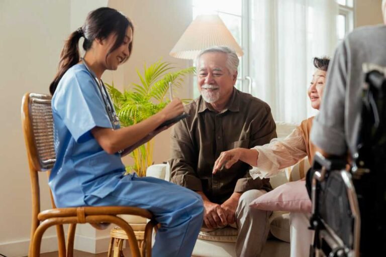 Elderly patients listening to a doctor.